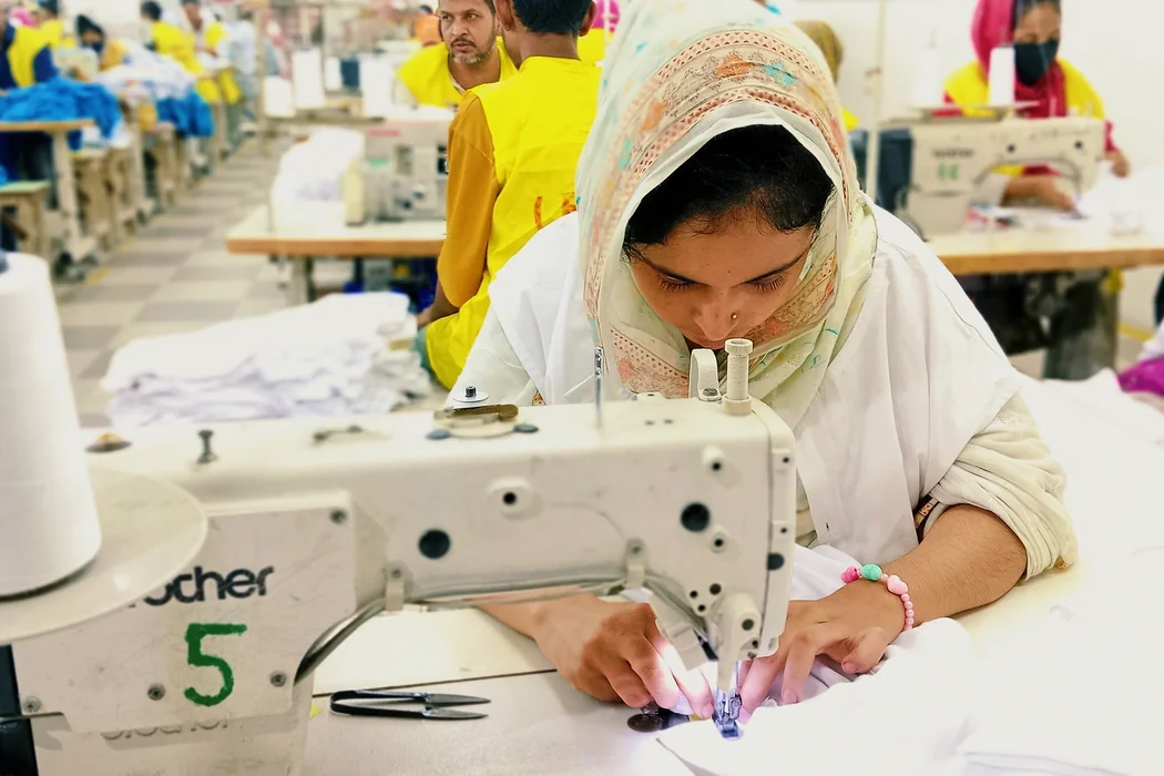 A worker sewing a garment at Shristy Fashion Ltd.